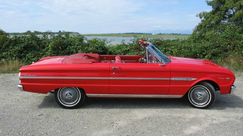 Red 1963 Ford Falcon Sprint convertible parked beside the Fraser River near Ladner, Delta BC
